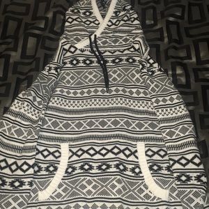 Stitched black and white sweater.